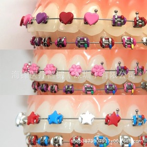 แหวนรัดฟัน 3 มิติ ลายการ์ตูนหลากสี ของ Hai Feng Dental อุปกรณ์จัดฟัน แพ็ค 20 ชิ้น - Product Image 1