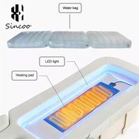 Lit de massage électrique moderne de luxe avec lumière LED en cuir véritable pour hôtel, école, entrepôt et chambre à coucher