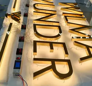 Placa de identificação de loja com letras de canal retroiluminadas 3D douradas personalizadas para publicidade externa LED
