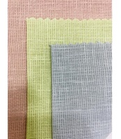 Tissu en coton et lin tissé léger et élégant avec finition teinte unie, texture douce et respirante, et confort optimal toute la journée