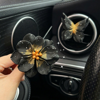 Diffuseur de parfum de luxe noir en résine pour voiture, clip de ventilation, parfum freesia, décoratif, longue durée, pierre parfumée naturelle