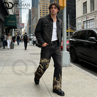 Jean large noir en denim respirant et écologique pour homme, brodé de nuages dorés, style streetwear artistique, collection automne