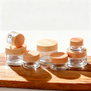 Crème cosmétique la plus vendue <span class=keywords><strong>en</strong></span> <span class=keywords><strong>pot</strong></span> <span class=keywords><strong>en</strong></span> <span class=keywords><strong>verre</strong></span> avec <span class=keywords><strong>action</strong></span> exfoliante et fini transparent 30g 50g 100g <span class=keywords><strong>Pot</strong></span> de crème avec couvercle <span class=keywords><strong>en</strong></span> bambou - Product Image 1