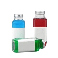 Vente en gros de bouteilles de boisson en verre transparentes créatives de 350 ml et 500 ml avec logo personnalisé, bouteille à jus et à thé réutilisable avec couvercle en aluminium