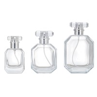 Fabrication sur mesure de flacons de parfum vides en verre transparent, écologiques et économiques, 30 ml, 50 ml, 100 ml, avec bouchon argenté et impression sérigraphique.
