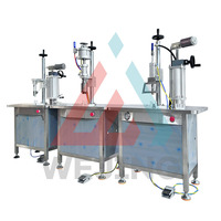 Machine de remplissage d'aérosols pneumatique semi-automatique efficace, sertissage et scellage de haute précision pour applications cosmétiques et chimiques