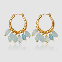 Vente en gros de boucles d'oreilles créoles tendance pour femmes en acier inoxydable plaqué or et améthyste faites à la main avec pampilles en pierre naturelle