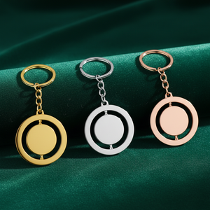 Logo personnalisé porte-clés en métal rotatif plaqué or rond tendance Prévention de la rouille vierge Mini porte-clés durables imprimés élégants - Product Image 1