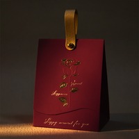 Boîte en papier de spécialité rose dorée Boîte à bonbons de mariage pour mariages Sac cadeau de bonbons imprimé avec poignée