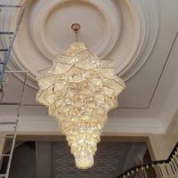 Villa lustre en cristal escalier tournant lampe de luxe hôtel bâtiment duplex haut de gamme lustre en acier inoxydable épaissi