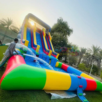 Structure gonflable commerciale d'extérieur/d'intérieur pour enfants avec double toboggan aquatique et escalier d'accès en PVC, idéale pour les fêtes, les écoles et l'usage résidentiel