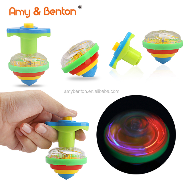 Novelty Bulk Toys Party Favors LED Light up Flashing UFO Bouncing Spinning Tops with Gyroscope