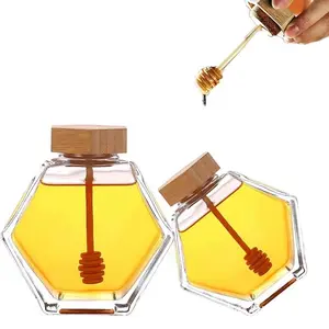 Botol kaca madu kualitas tinggi, botol kaca madu bentuk segi enam dengan tutup kayu, tongkat pengaduk wadah