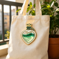 En gros : Pins en émail en métal à paillettes liquides, motif bouteille de potion magique en forme de cœur, badges artisanaux personnalisés, pins de revers Quicksand