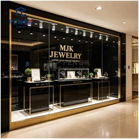 Vitrine de présentation de bijoux sur mesure en or noir et diamant pour magasin de bijouterie, comptoir d'essayage et mobilier de présentation