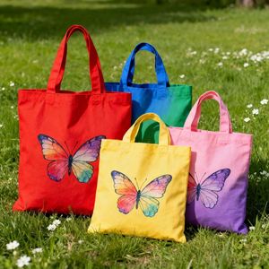Grand sac fourre-tout en coton personnalisé réutilisable avec motif papillon coloré sur toile vierge - Product Image 1