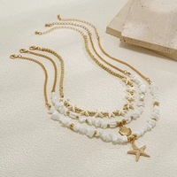 Collier multicouche en fausses perles et pierres pour femme, style bohème, avec pendentif étoile de mer et coquillage, chaîne de clavicule