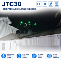 Drone de nettoyage haute pression UAV à jet d'eau de précision pour fenêtres de grande hauteur, conception compacte près des murs pour les services publics
