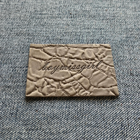 Étiquettes en cuir PU véritable avec logo personnalisé en relief et peaux de serpent sculptées, à coudre pour vêtements, patchs et étiquettes de sacs – Vente en gros