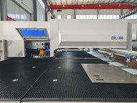 Machine de perforation de tôles et panneaux métalliques Rexroth / tourelle servo CNC avec fonction de découpe et de marquage laser
