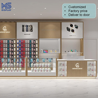 Conception d'intérieur personnalisée pour boutique de téléphonie mobile, ensemble complet de comptoirs et vitrines pour accessoires de téléphonie mobile pour l'ouverture d'un nouveau magasin