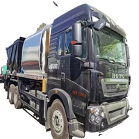 Camión de reparación de baches de asfalto de 12000 litros Sino Howo con componente de núcleo de motor de alta calidad