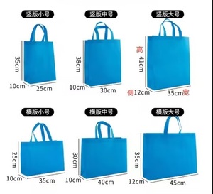 Bolsas de tela no tejida universales para publicidad de ropa, venta al por mayor del fabricante, con base angulada, logotipo serigrafiado y parche reciclable - Product Image 1