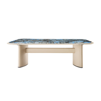 Table basse de réception d'hôtel en panneau haute densité effet peau et surface en pierre artificielle bleue
