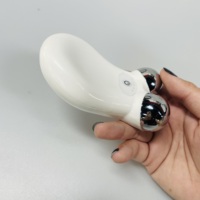 Vente en gros de mini masseur de cou électrique rechargeable, outil de massage du cou, masseur de visage vibrant intelligent pour portable