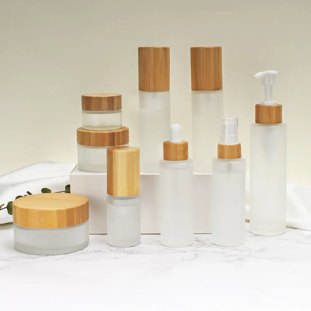Frascos de vidrio y tapa de botellas con tapa de bambú para cuentagotas Spray Embalaje de madera Cosmético esmerilado 20ml 30ml 50ml Cartón redondo QR
