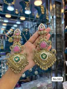 Premium Golden Jhumka Earrings Adorned with <b>Emerald</b> Green Center Stone and Small White Pearls Ethnic Bridal Fashion Jewelry - Product Image 5