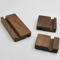 Support de téléphone en bois massif de noyer noir personnalisé, support de téléphone de bureau multifonctionnel et créatif, et station d'accueil pour iPhone
