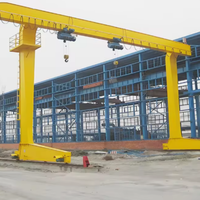 Grue portique à double poutre en acier, sur rail, pour usage industriel extérieur intensif, conçue sur mesure, capacité de levage 20 tonnes, portée 10m