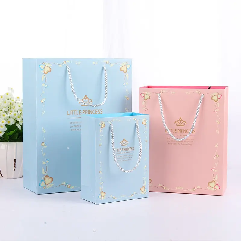 Luxury Custom Size Clothes Package Paper Handle Paper Bag Kraft Paper Folding Gift Shopping Bags