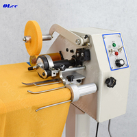 Machine de découpe électrique automatique pour bandes de reliure, rubans et tissus non tissés