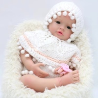 Poupée bébé fille réaliste 22 pouces Silicone souple et corps lesté Reborn Baby Dolls jouet de dessin animé de mode