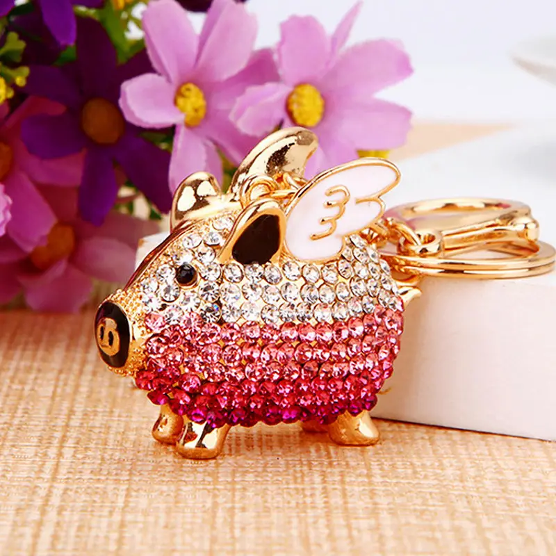 Bling Crystal Rhinestone Flying Piggy llavero con incrustaciones de diamante Animal cerdo metal llaveros colgante mujer regalo Zodiaco cerdo llavero