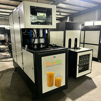 Machine de soufflage de bouteilles en plastique PET semi-automatique à 2 cavités 202 211 pour la fabrication de bouteilles de type canette à partir de préformes PET de 28 mm 1810.