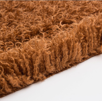Nouveau tissu en fausse fourrure bouclée longue en polyester tricoté 100 % effet cascade pour vêtements, tapis et jouets
