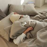 Parure de lit quatre pièces en coton 100% de qualité supérieure pour bébé, motif gaufré, réversible, 600 fils, couleur unie, drap et housse de couette, luxueuse et haut de gamme