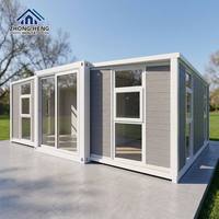 Conteneur de stockage modulaire préfabriqué de luxe moderne de 40 pieds en panneaux sandwich d'acier extensibles à double aile de qualité supérieure pour