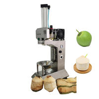 Machine à décortiquer les noix de coco automatique commerciale à succès avec perforateur, haute efficacité, rapide et sûre pour l'élimination de la peau de la noix de coco