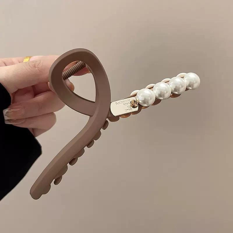 Retro pearl earth cafe cross grab clip