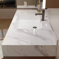 Nouvelle combinaison d'armoires de salle de bain de style moderne, style chinois nouveau, style médiéval, avec lavabo en céramique sans joint en plaque de roche