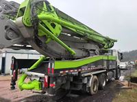 Pompe à béton mobile sur camion diesel d'occasion ZOOMLION 52 m à vendre