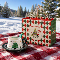 Ensemble tasse et soucoupe en céramique Anji Newell pour Noël avec design de dessin animé, conservation de la chaleur, couleur et logo personnalisés, emballage en boîte cadeau