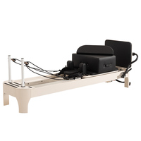 Lit d'entraînement de Pilates portable personnalisé, blanc, en bois arrondi, avec lit de Pilates confortable pour le renforcement du tronc