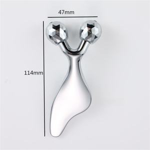 Masseur facial <span class=keywords><strong>Gua</strong></span> <span class=keywords><strong>Sha</strong></span> en alliage de zinc à double boule pour le lifting du visage en V, outil ergonomique pour raffermir les <span class=keywords><strong>yeux</strong></span> et les joues - Product Image 1