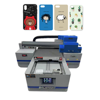 Imprimante UV haute vitesse 4060 A2 taille avec deux têtes rotatives pour t-shirt acrylique métal coque de téléphone chaussure stylo prix de la Machine d'impression