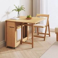 Ensemble de meubles combinés : Table pliante multifonctionnelle en bois massif au design peu encombrant et chaise de salle à manger mobile à roulettes universelles